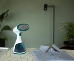 Tomado TSH1201W - Kledingstomer - 1200 Watt - RVS Zool - Wit/turquoise 18 Tomado TSH1201W - Kledingstomer - 1200 Watt - RVS Zool - Wit/turquoise -Leifheit Store 1200x1003 6